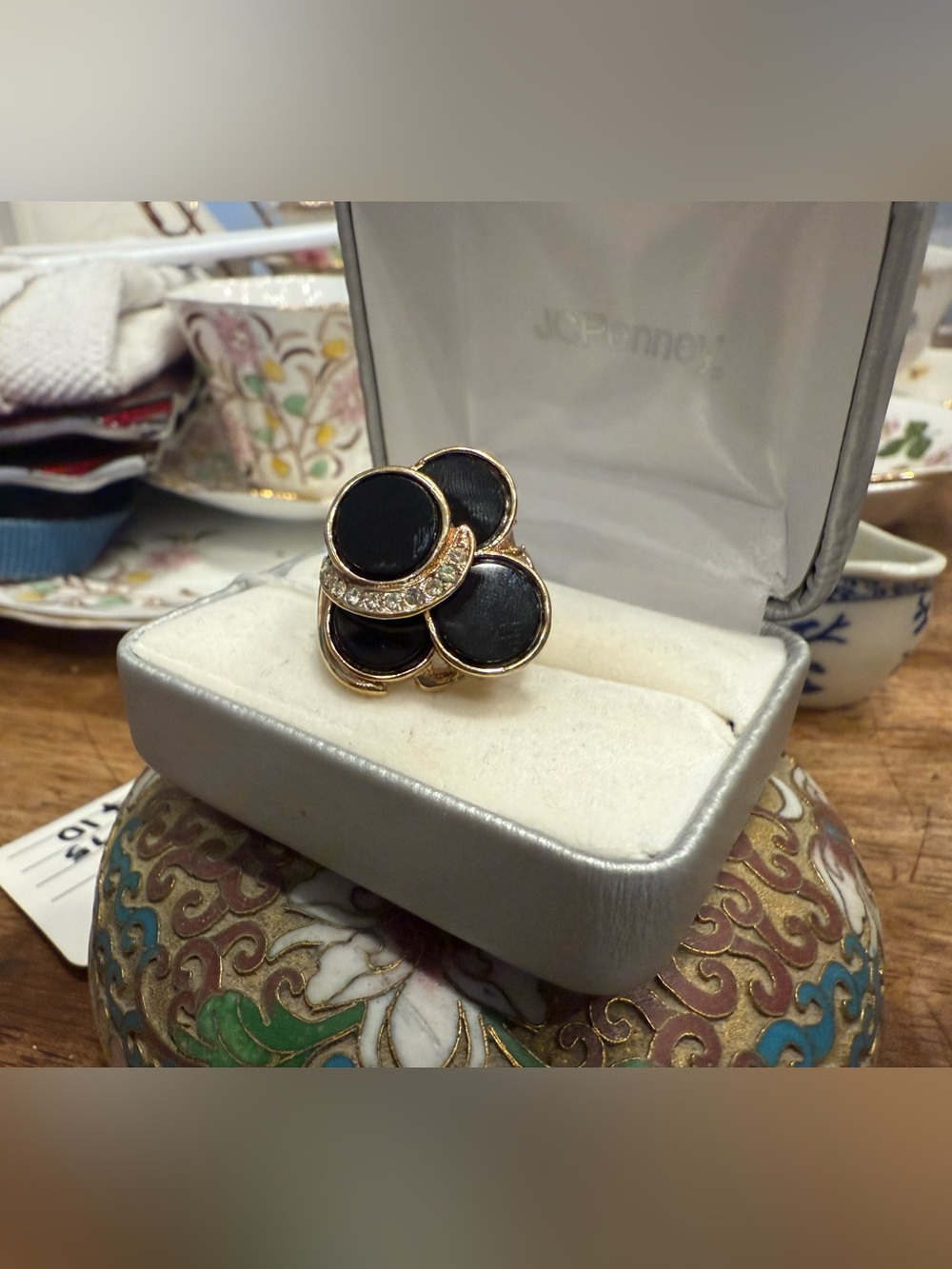Gold-Tone Black Enamel Ring with Crystal Accent